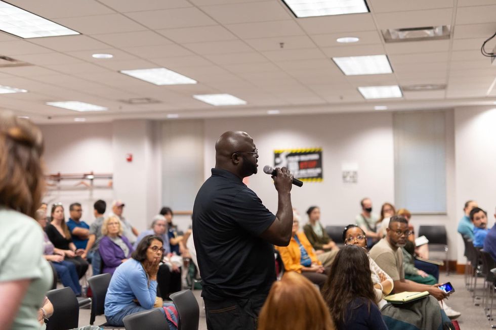 Resident speaks at an event about the Midwest hydrogen hub organized by Just Transition NWI.